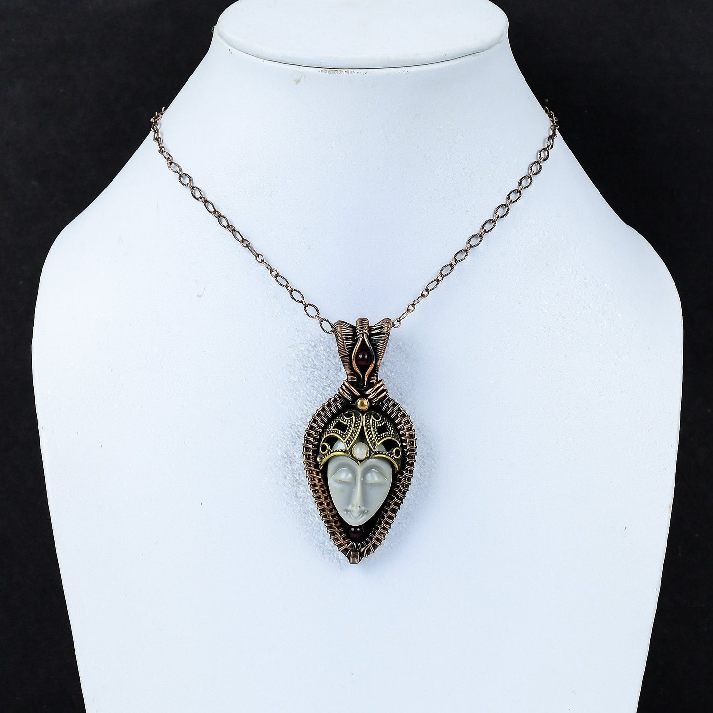 Grey Carved Bone Face Gemstone Pendant