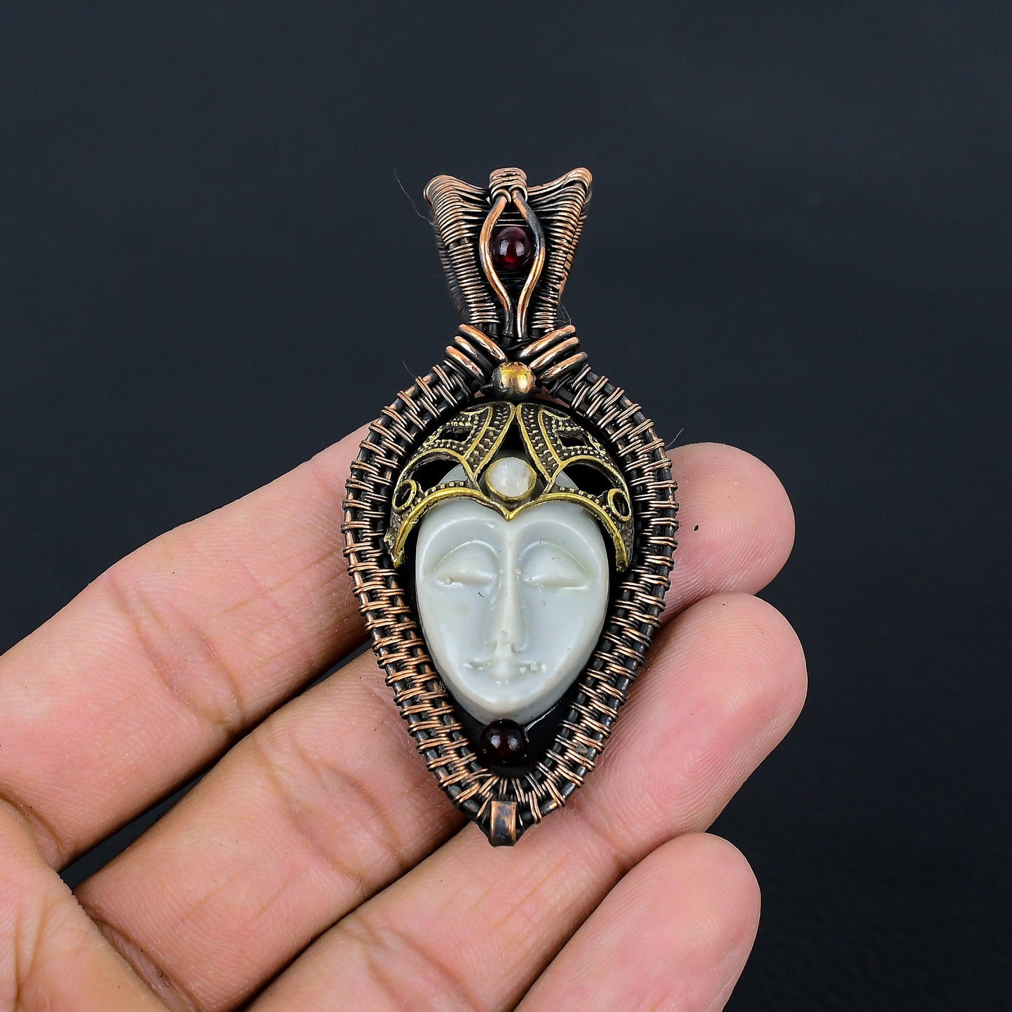 Grey Carved Bone Face Gemstone Pendant