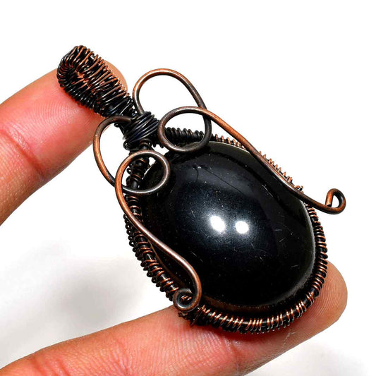 Obsidian Shield – Copper-Wrapped Pendant
