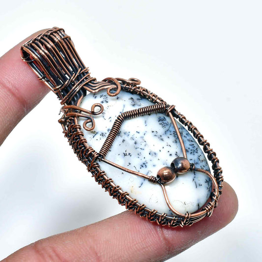 Earth’s Embrace – Dalmatian Jasper Copper Pendant