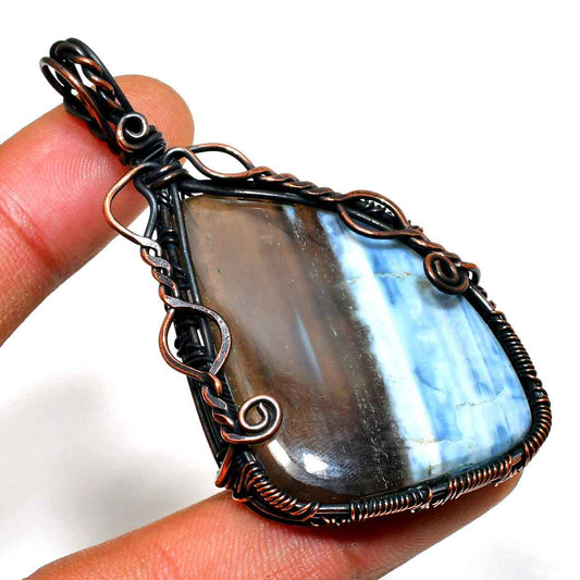 Serenity’s Embrace – Blue Lace Agate Copper Pendant
