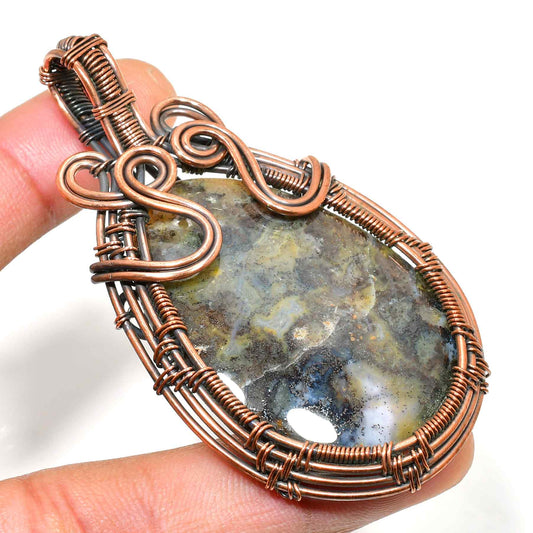 Earth’s Embrace – Oxidized Copper Stone Pendant