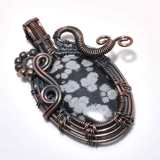 Serenity’s Embrace – Snowflake Obsidian Copper Pendant