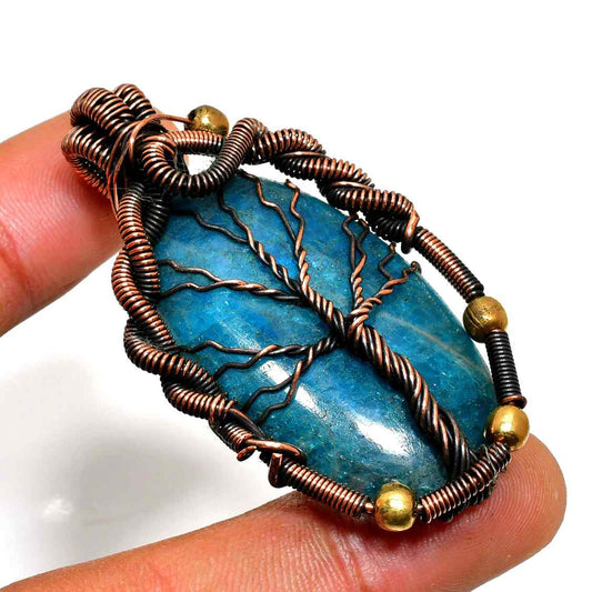 Starlight Grove – Copper-Wrapped Blue Crystal Pendant