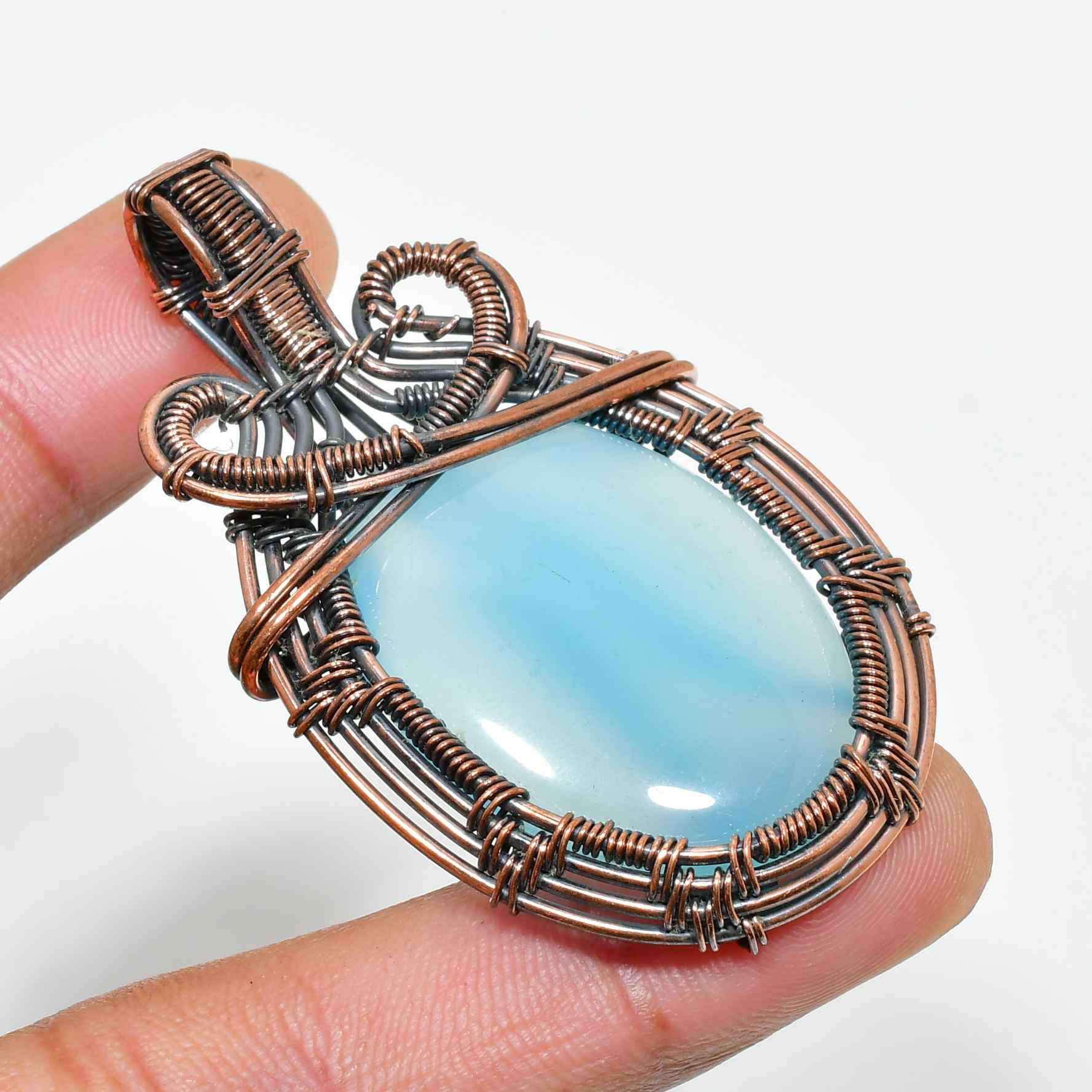 Serenity’s Embrace – Blue Lace Agate Copper Pendant