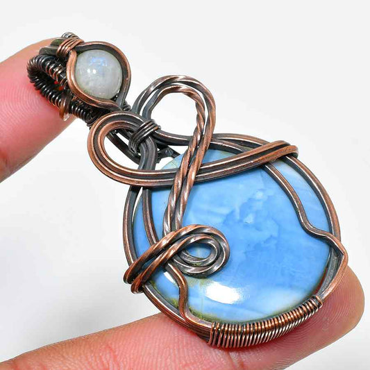 Serenity’s Embrace – Blue Lace Agate Copper Pendant