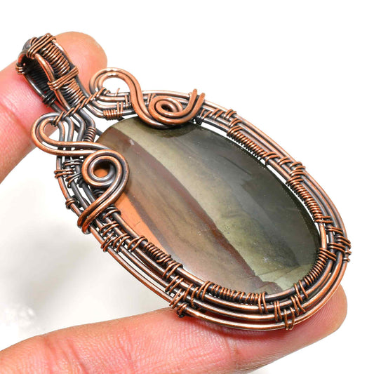 Nature’s Harmony – Serene Stone Copper Pendant