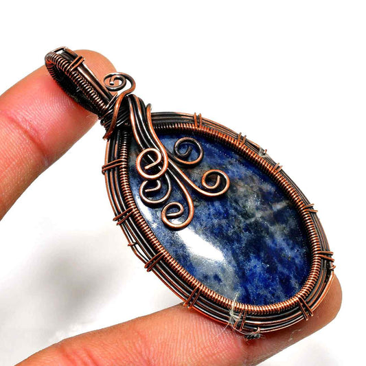 Serenity’s Embrace – Sodalite Copper Pendant