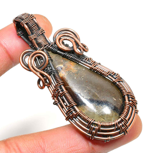 Ember’s Embrace – Black Tourmaline Copper Pendant