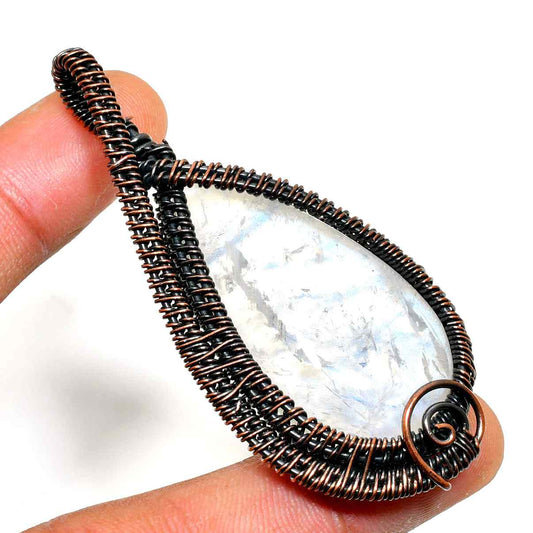 Clarity’s Embrace – Copper-Wrapped Quartz Pendant