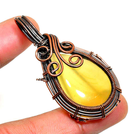 Solara’s Ember – Copper-Wrapped Yellow Gem Pendant