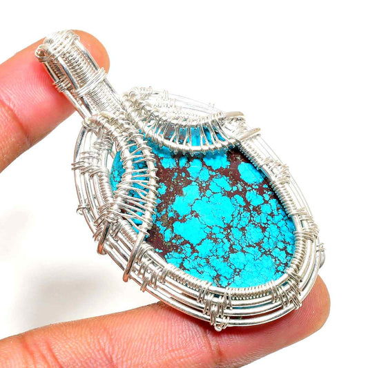 Serenity’s Embrace – Turquoise & Silver Wire Pendant
