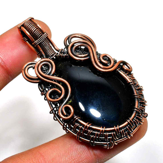 Celestial Embrace – Black Onyx Copper Pendant