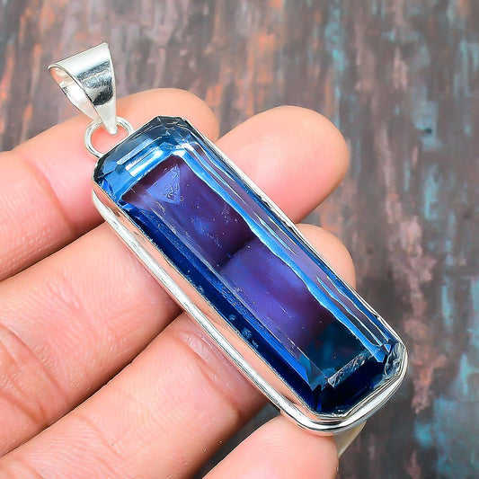 Ocean’s Whisper – Blue Topaz Sterling Silver Pendant
