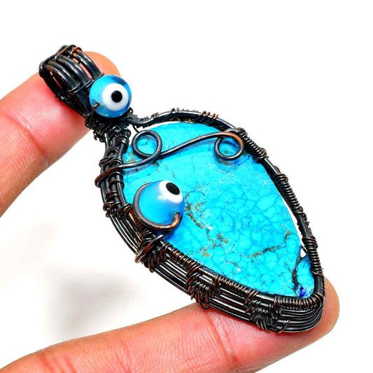 Ocean’s Guardian – Turquoise & Black Wire Pendant