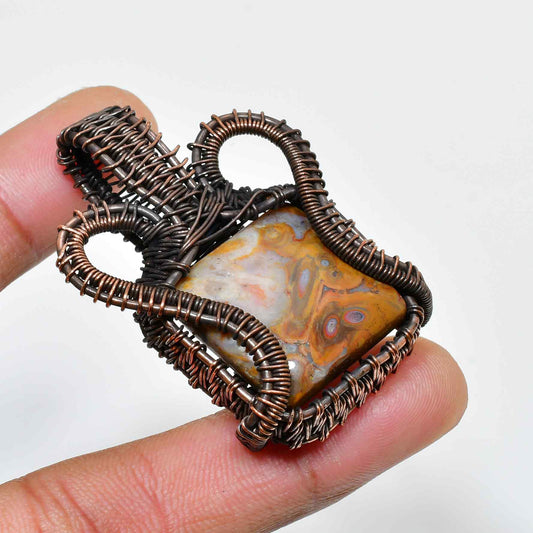 Terra’s Embrace – Oxidized Copper Stone Pendant