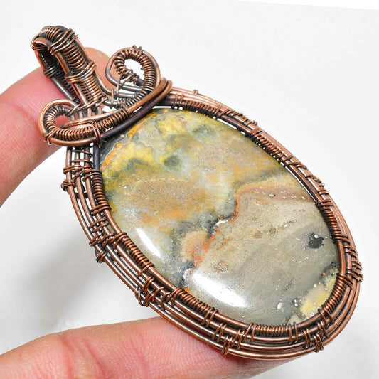 Terra’s Embrace – Copper-Wrapped Agate Pendant