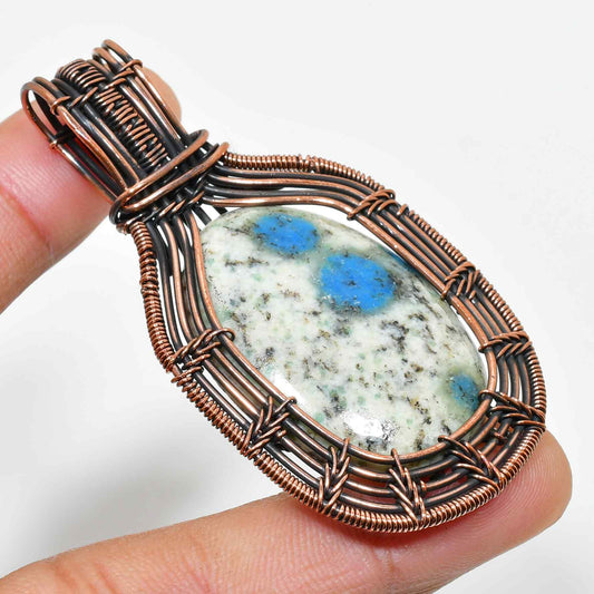 Nature’s Anchor – Copper-Wrapped Stone Pendant