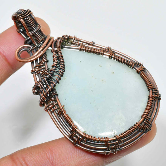 Serenity’s Embrace – Aquamarine & Copper Pendant