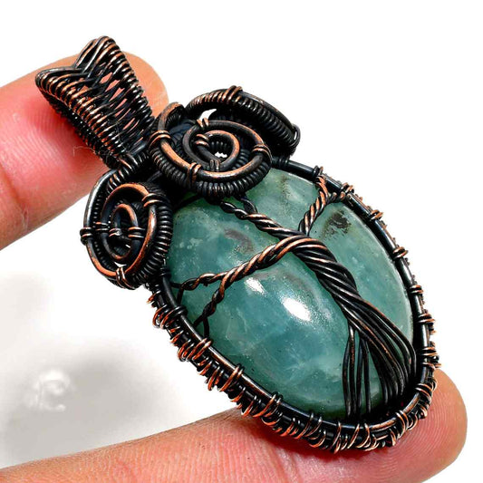 Ocean’s Embrace – Aquamarine Copper Pendant