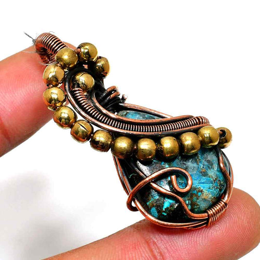 Azure’s Embrace – Turquoise Copper Pendant