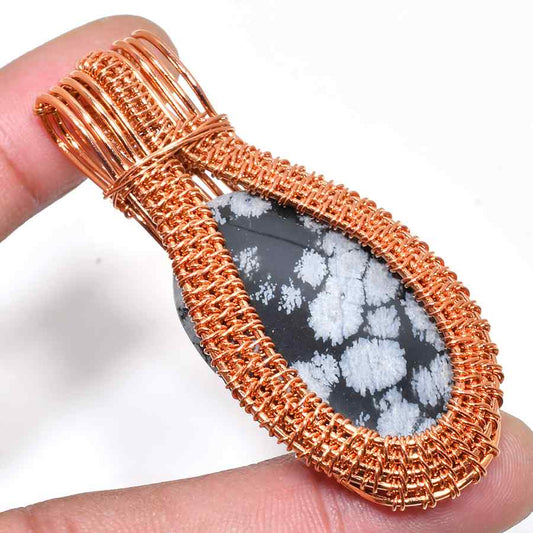 Eira’s Shield – Snowflake Obsidian Copper Pendant