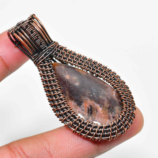 Terra’s Embrace – Oxidized Copper Crystal Pendant