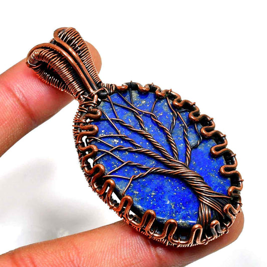 Gaia’s Embrace – Copper-Wrapped Lapis Lazuli Pendant