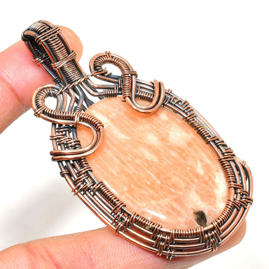 Solar Embrace – Sunstone Copper Pendant