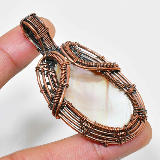 Whispers of the Sea – Copper-Wrapped Shell Pendant