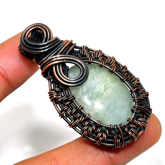 Celestial Embrace – Aquamarine Copper Pendant