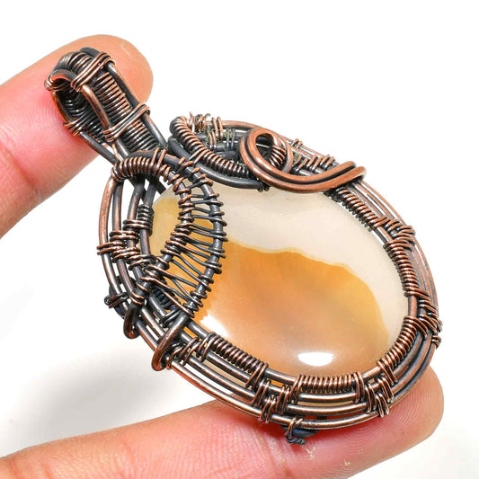 Gaia’s Balance – Oxidized Copper Agate Pendant