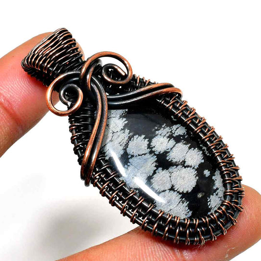 Shadow’s Embrace – Obsidian Copper Pendant