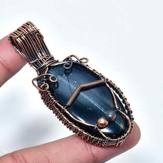 Midnight Embrace – Copper-Wrapped Black Onyx Pendant