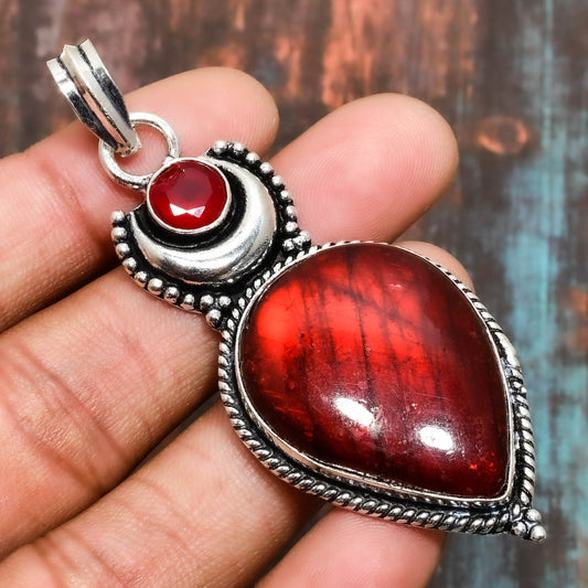 Crimson Embrace – Sterling Silver & Genuine Red Stone Pendant
