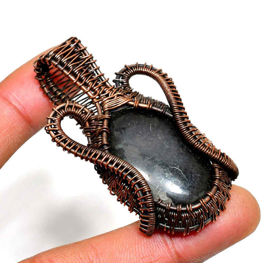 Obsidian Embrace – Oxidized Copper Pendant