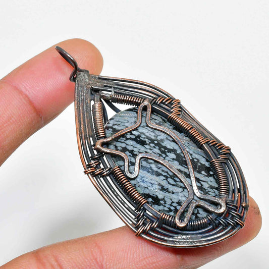 Ocean’s Spirit – Black Stone Dolphin Pendant