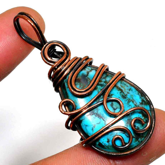 Serenity’s Embrace – Turquoise Copper Pendant