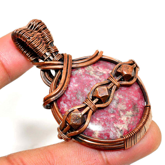 Ember’s Embrace – Rhodonite Copper Pendant