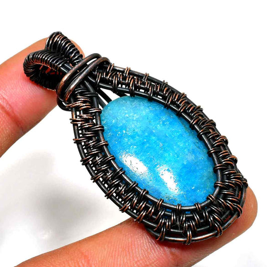 Ocean’s Embrace – Aquamarine Copper Pendant