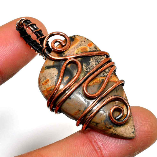Ember’s Essence – Raw Stone & Oxidized Copper Pendant