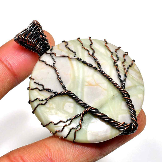 Nature’s Embrace – Copper-Wrapped Jade Tree Pendant