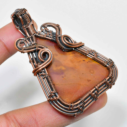 Amber’s Embrace – Amber & Oxidized Copper Pendant