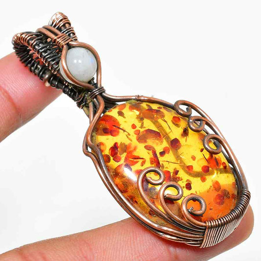 Amber’s Embrace – Handwrapped Copper Pendant