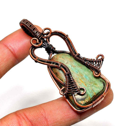 Serenity’s Embrace – Oxidized Copper Stone Pendant