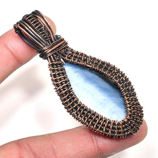 Ember’s Embrace – Blue Lace Agate Copper Pendant