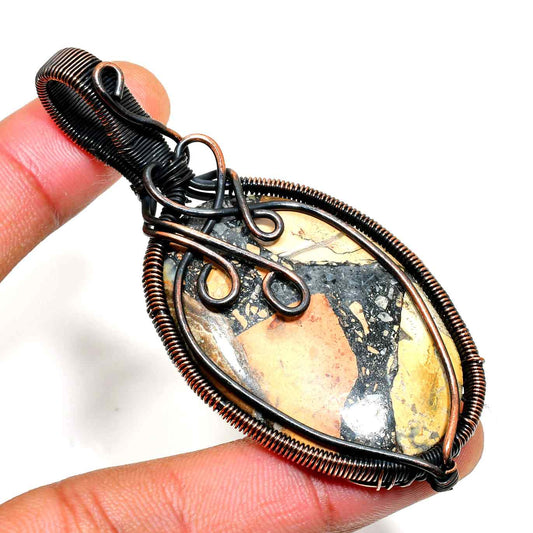 Nature’s Embrace – Copper-Wrapped Gemstone Pendant