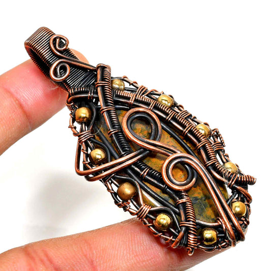 Gaia’s Embrace – Copper-Wrapped Gemstone Pendant