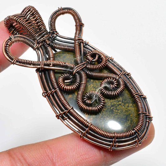 Shadow’s Embrace – Obsidian Copper Pendant
