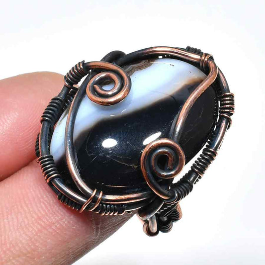 Serenity’s Embrace – Black Agate Copper Pendant